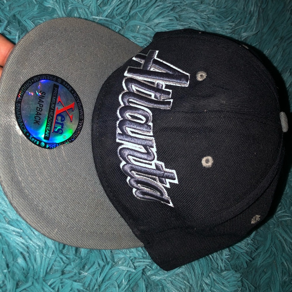 Adjustable snap back cap